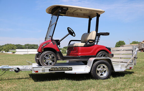 executive with golf cart loaded
